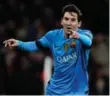  ?? AFP/GETTY IMAGES ?? Barcelona forward Lionel Messi celebrates scoring his team’s first goal against Arsenal on Tuesday.