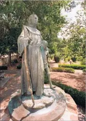  ?? Steve Osman Los Angeles Times ?? TWO YEARS after he was elevated to sainthood, statues of Junipero Serra continue to be vandalized.