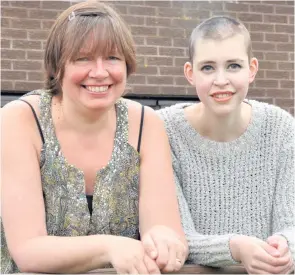  ?? CHRIS MCCULLOUGH ?? Thriving: Lana Douglas from Carrickfer­gus with her mum Colleen