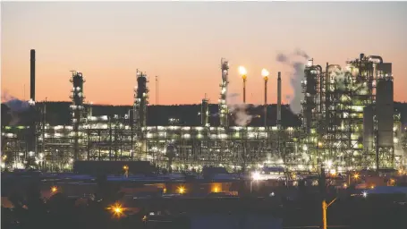  ?? REUTERS ?? Irving Oil already operates a refinery in Saint John, N.B., above, and with a deal to acquire the troubled Come by Chance Refinery in Newfoundla­nd, would have a monopoly on petroleum refining in Atlantic Canada. It would also gain retailing and distributi­on assets.