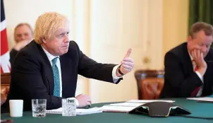  ??  ?? The Prime Minister makes a point during the crunch Brexit video call summit