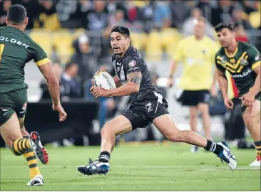  ?? Photo: PHOTOSPORT ?? Dazzling run: Shaun Johnson makes his great break for a try during the Kiwis’ win over Australia on Saturday.