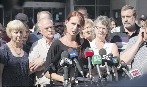  ?? PETER POWER / THE CANADIAN PRESS ?? Sharlene Bosma, with her family and that of her late husband Tim Bosma, makes a statement along with Tim’s parents Mary, left, and Hank following the guilty verdicts of Dellen Millard and Mark Smich on Friday.