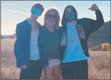  ??  ?? Britney Spears posts a snap of herself standing between sons Sean, 15, and Jayden, 14, on Instagram.