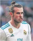  ??  ?? MOLESTIA. Bale se retiró lesionado frente al Atlético.