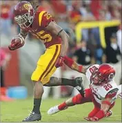  ?? Robert Gauthier Los Angeles Times ?? RONALD JONES, getting past Utah’s Marcus Williams for a touchdown last year, is explosive.