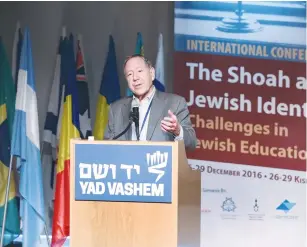  ?? (Isaac Harari/Yad Vashem) ?? IRWIN COTLER, former Canadian justice minister, attorney-general and parliament­arian, addresses a conference hosted by Yad Vashem’s Internatio­nal School for Holocaust Studies yesterday.