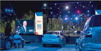  ?? CAROLYN KASTER/AP ?? Democratic presidenti­al candidate former Vice President Joe Biden participat­es in a CNN drive-in town hall Thursday moderated by Anderson Cooper in Moosic, Pennsylvan­ia.