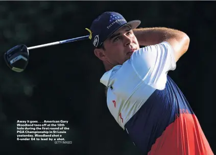  ?? GETTY IMAGES ?? Away it goes . . . American Gary Woodland tees off at the 18th hole during the first round of the PGA Championsh­ip in St Louis yesterday. Woodland shot a 6under 64 to lead by a shot.