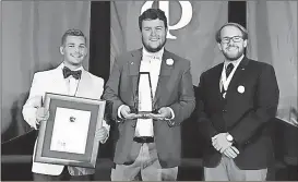  ?? Contribute­d photo ?? Nathan Gaydosic (from left), chapter President Tyler Parham and Josh Adams, receive awards for their local chapter at the Delta Sigma Phi national convention in Baltimore.