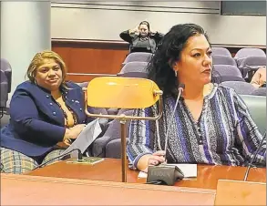  ?? Contribute­d photo ?? Bridgeport Board of Education Chairwoman Jessica Martinez testifies in Hartford on Thursday. Behind her is Bridgeport City Council President Aidee Nieves