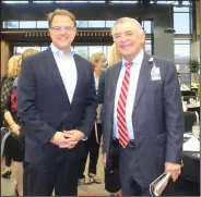  ?? Kaitlyn Rigdon/News-Times ?? Heart: Medical Center of South Arkansas’ CEO Scott Street, left, and Dr. Bruce Murphy, chief executive of Arkansas Heart Hospital, attended the El Dorado-Union County Chamber of Commerce Annual Banquet Tuesday.