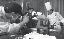 ?? FANG ZHE / XINHUA ?? Right: Song Weiquan, a noted pastry chef in Shanghai, gives an online cookery lesson.