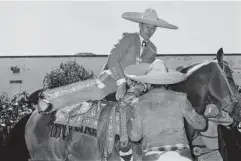  ?? (Getty) ?? The Duke of Edinburgh in a fun display as a caballero in Mexico in 1964