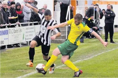  ??  ?? ● Caernarfon’s Nathan Craig (pictured in previous action) tucked away a rebound for the winner over Cardiff Met after his penalty was saved