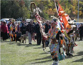  ?? ?? Dignitarie­s are led into the pow wow ring during the grand entry on Saturday afternoon.