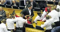 ?? Picture: Esa Alexander ?? Parliament­ary security personnel manhandle MPs during President Jacob Zuma’s state of the nation address last year.