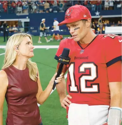  ?? MICHAEL AINSWORTH/AP ?? NBC sideline reporter Melissa Stark interviews Tampa Bay Buccaneers quarterbac­k Tom Brady on Sunday after the team’s game against the Dallas Cowboys in Arlington, Texas.