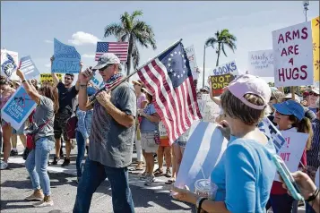  ?? MEGHAN MCCARTHY / THE PALM BEACH POST ?? Thousands attend a March for Our Lives march from Dreher Park to Flagler Drive on Saturday in West Palm Beach. Marchers are calling for an end to gun violence and mass shootings at schools.