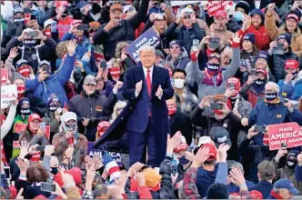  ?? AP-carlos Osorio ?? President Donald Trump arrives at a campaign rally Saturday in Norton Shores, Mich.