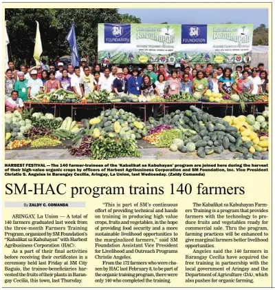  ??  ?? HARBEST FESTIVAL — The 140 farmer-trainees of the ‘Kabalikat sa Kabuhayan’ program are joined here during the harvest of their high-value organic crops by officers of Harbest Agribusine­ss Corporatio­n and SM Foundation, Inc. Vice President Christie S....