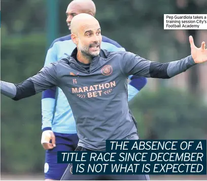  ??  ?? Pep Guardiola takes a training session City’s Football Academy