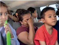  ?? AFP, Reuters file ?? NOWHERE TO GO: Migrants, deported from the US, wait at the El Chaparral border crossing in Mexico.—