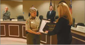  ??  ?? Denise Croker, daughter of Billy Croker, received a gavel and copy of the proclamati­on honoring her father on April 7.