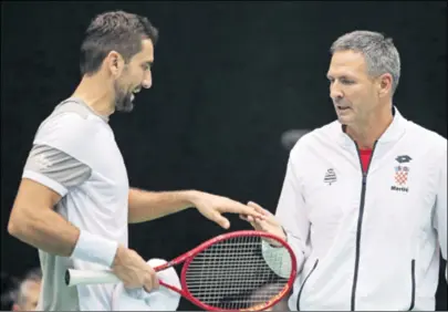  ??  ?? ČILIĆ I MARTIĆ dobro surađuju jer Marin igra dobro, a to pokazuje i podatak da je u Stuttgartu pobijedio dvojicu (Šapovalova i Auger-Aliassimea) koja su sada u četvrtfina­lu Wimbledona