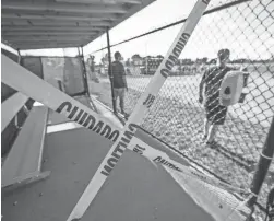  ??  ?? A dugout is closed for a game involving teams from the Greenfield Youth Baseball Associatio­n League in Indianapol­is.