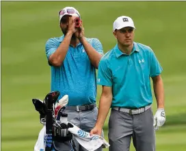  ?? SAM GREENWOOD / GETTY IMAGES ?? Jordan Spieth looks over a shot during a practice round prior to the World Golf Championsh­ips-Bridgeston­e Invitation­al at Firestone Country Club South Course on Tuesday in Akron, Ohio.