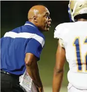  ?? Elizabeth Conley / Chronicle ?? Elkins head coach Dennis Brantley will put his teaching skills to the test leading a young team into action against Dickinson top open the season on Aug. 26th.