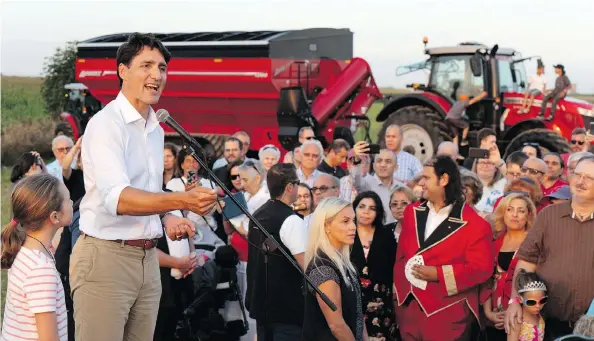  ?? PAUL CHIASSON / THE CANADIAN PRESS FILES ?? Prime Minister Justin Trudeau addresses local Liberal MPS and supporters from the South Shore of Montreal for a summer corn roast in Sabrevois, Que., last Thursday.