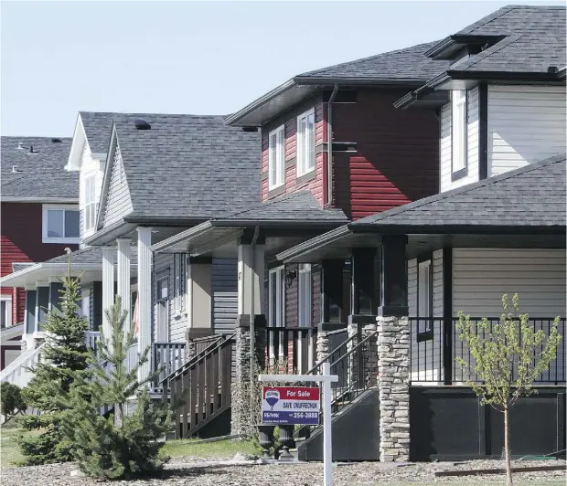  ?? CHRISTINA RYAN / POSTMEDIA NEWS ?? Despite the downturn in oil, the Calgary real estate market has held up well, Martin Pelletier writes. Average housing prices are up 17 per cent.