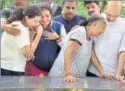  ?? PTI FILE ?? Journalist Gauri Lankesh’s family grieves near her body. Over the past four months, the state government and SIT have come under pressure to ensure that the case is solved soon.