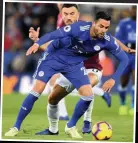  ??  ?? FAMILIAR FACE: Vicente Iborra playing for Leicester City. Below, fans at the last game of the season against Tottenham