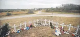  ?? Scott Olson, Getty Images ?? Twenty-six crosses stand in a field on the edge of town to honor the 26 victims killed in Sutherland Springs, Texas.