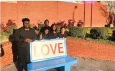  ?? (Special to The Commercial/Arts & Science Center for Southeast Arkansas) ?? Patrons can pose with the public art project “The Loveseat,” by artist Eric Freeman, now on display at the Arts & Science Center for Southeast Arkansas.