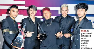  ??  ?? CNCO. El grupo arrasó como dúo o banda favorita y también artista favorito pop.