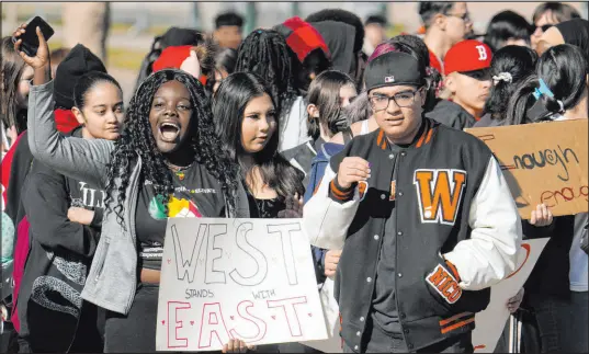  ?? David Zalubowski The Associated Press ?? West High School students join students from East High to call for gun control measures to be considered by state lawmakers during a March 2023 rally outside the Capitol in Denver. A shooting had left two administra­tors injured at East High.