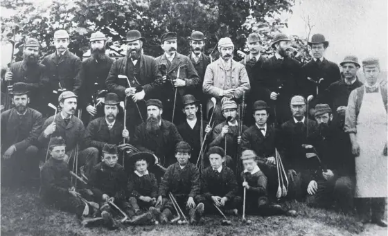  ??  ?? Carnoustie Golf Club’s members in 1885 included a number of the workers at the legendary Simpson clubmaking company which spawned some of the pioneers, and, below, a book compiled by Donald Ford to mark the club’s 175th anniversar­y.