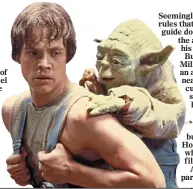  ??  ?? CARRYING THE BURDEN: Mark Hamill as Luke Skywalker with his Jedi mentor Yoda