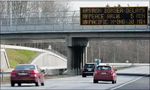  ?? JENELLE SCHNEIDER/PROVINCE FILES ?? About 50,000 fewer British Columbians per month are using the Peace Arch border crossing since the Canadian dollar started plummeting.