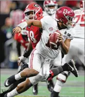  ?? CURTIS COMPTON / CCOMPTON@AJC.COM ?? Alabama’s Tua Tagovailoa came off the bench in the national championsh­ip game to spark a second-half comeback and beat Georgia 26-23 in overtime.