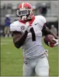  ?? John Raoux / AP ?? UGA’s running back Sony Michel runs a 45-yard touchdown.