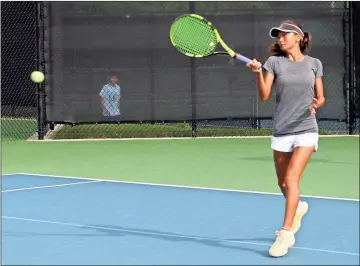  ??  ?? ABOVE: Kate Lee of Concord, California, sends back a shot in her consolatio­n draw match at the USTA Girls 14 &amp; U National Championsh­ips at the Rome Tennis Center.