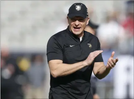  ?? JIM COWSERT — ASSOCIATED PRESS FILE ?? Army head coach Jeff Monken watches as his team warms up before they play Houston in the Armed Forces Bowl in Fort Worth, Texas, last December.