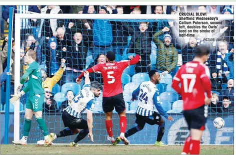  ?? PICTURE: Alamy ?? CRUCIAL BLOW: Sheffield Wednesday’s Callum Paterson, second left, doubles the Owls’ lead on the stroke of half-time