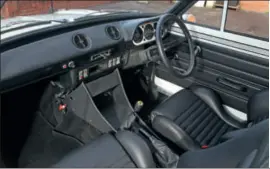  ??  ?? Interior features retrimmed Escort RS Turbo Recaros and a repro period Springalex wheel.
