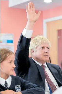  ?? Reuters ?? Johnson, en una visita a una escuela londinense